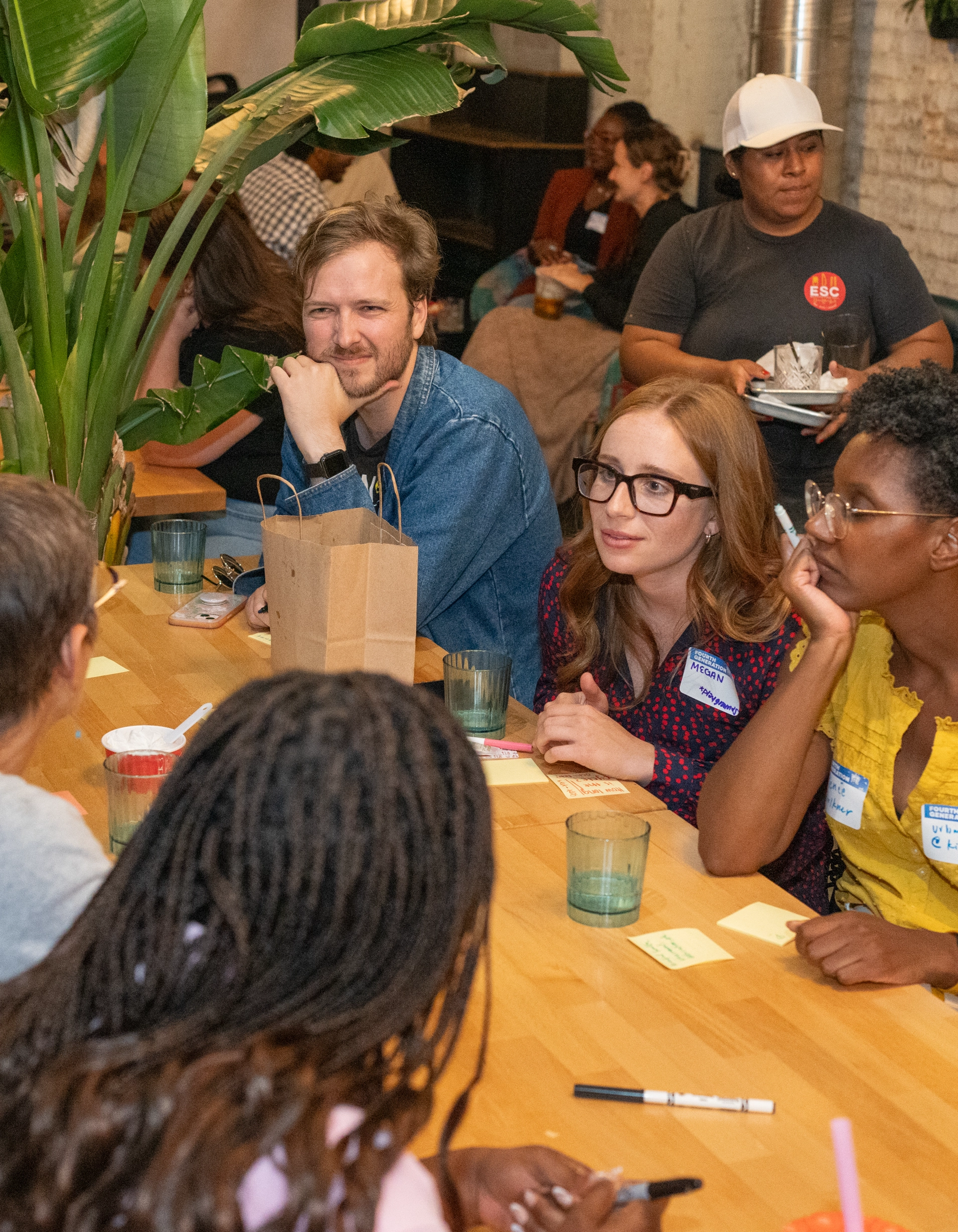 Small group chatting at Fourth Generation kick-off event