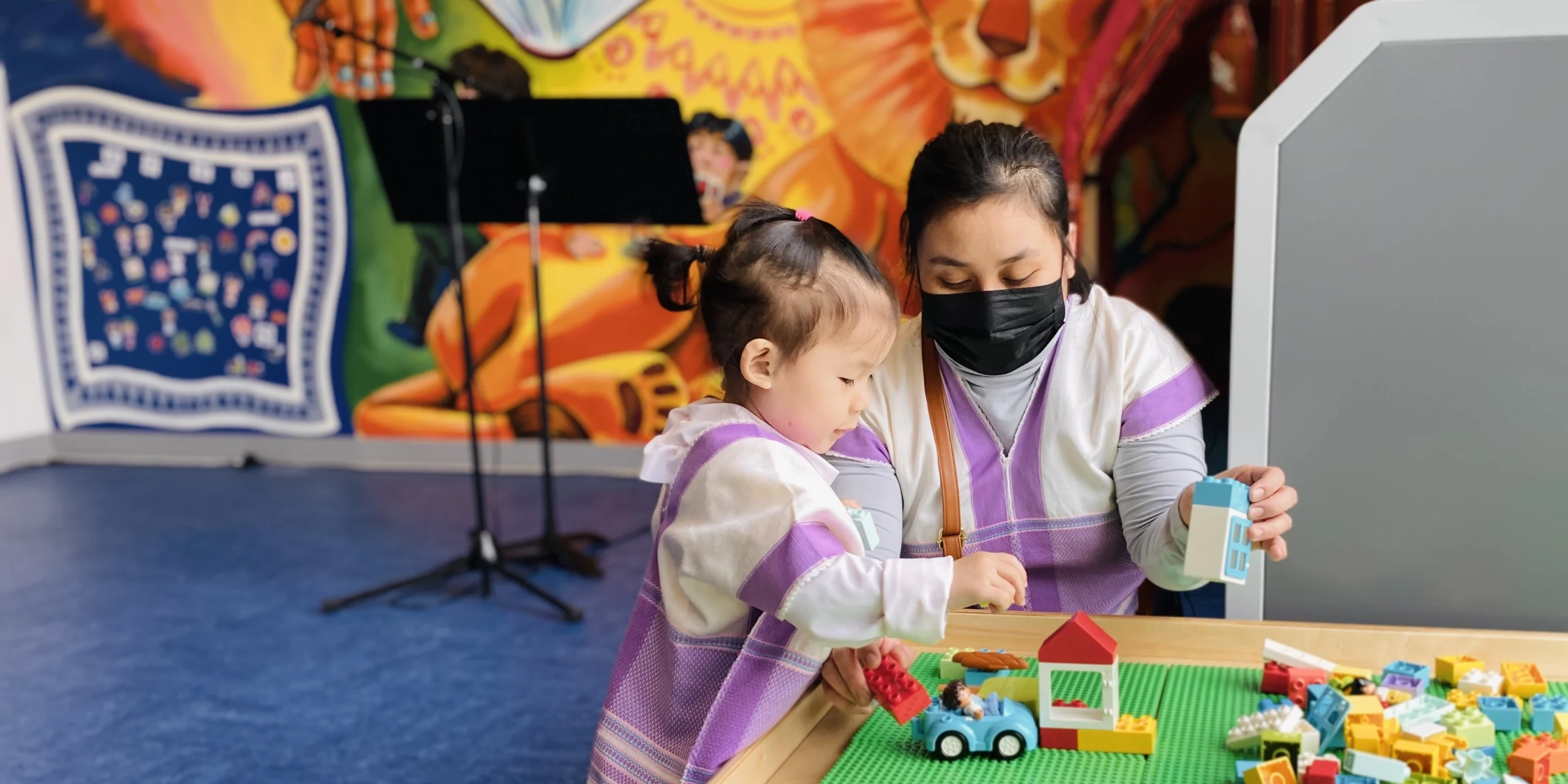 Mother and child in play and learning space